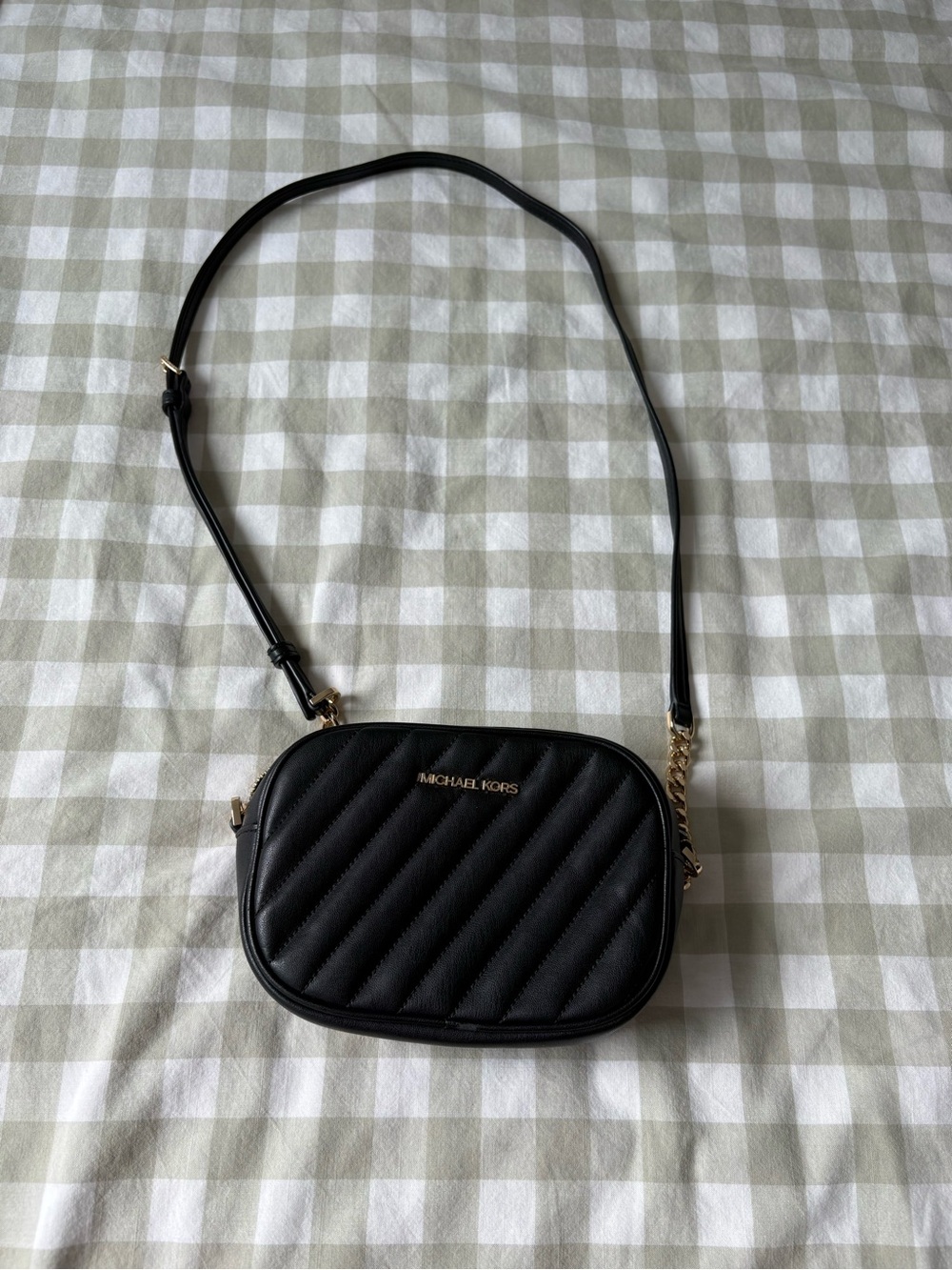 Michael Kors Black Quilted Oval Crossbody with Gold Hardware